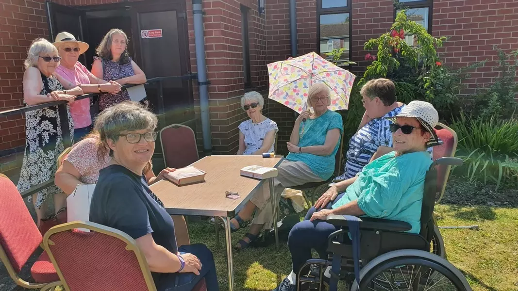 Book club taking advantage of the sunshine